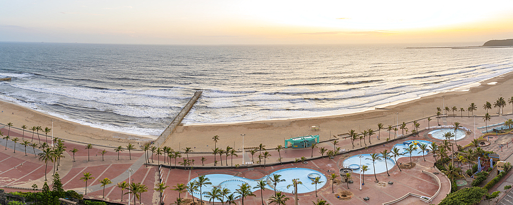 Elevated view of beaches, promenade and Indian Ocean at sunrise, Durban, KwaZulu-Natal Province, South Africa, Africa