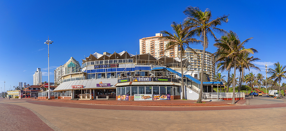 View of shops, restaurants and bars on promenade, Durban, KwaZulu-Natal Province, South Africa, Africa