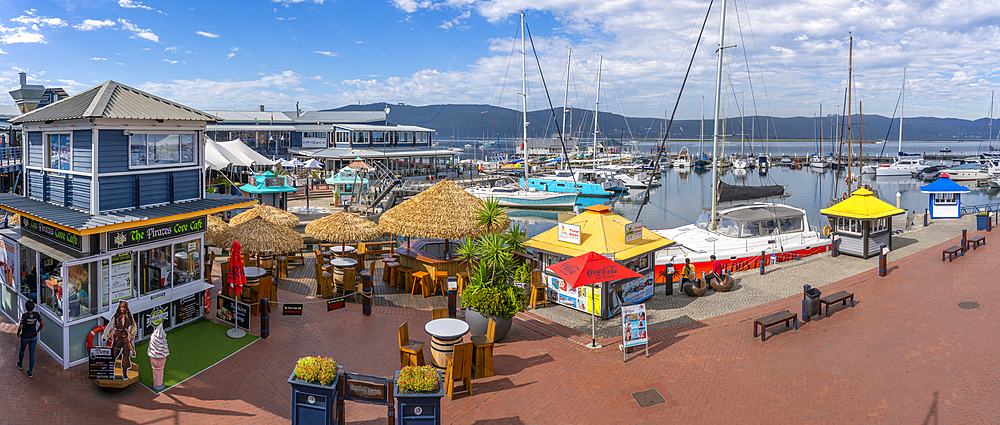 View of boats and restaurants at Knysna Waterfront, Knysna, Garden Route, Western Cape, South Africa, Africa