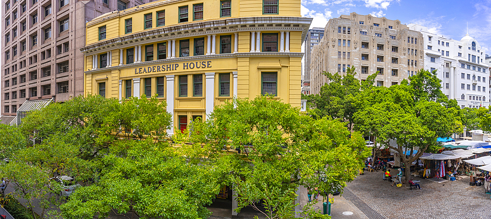 Elevated view of trees, buildings and souvenir stalls on Greenmarket Square, Cape Town, Western Cape, South Africa, Africa