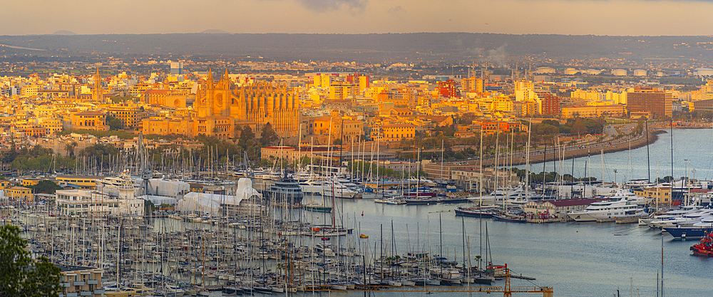 View of city skyline of Palma and cathedral from Castell de Bellver at sunset, Majorca, Balearic Islands, Spain, Mediterranean, Europe