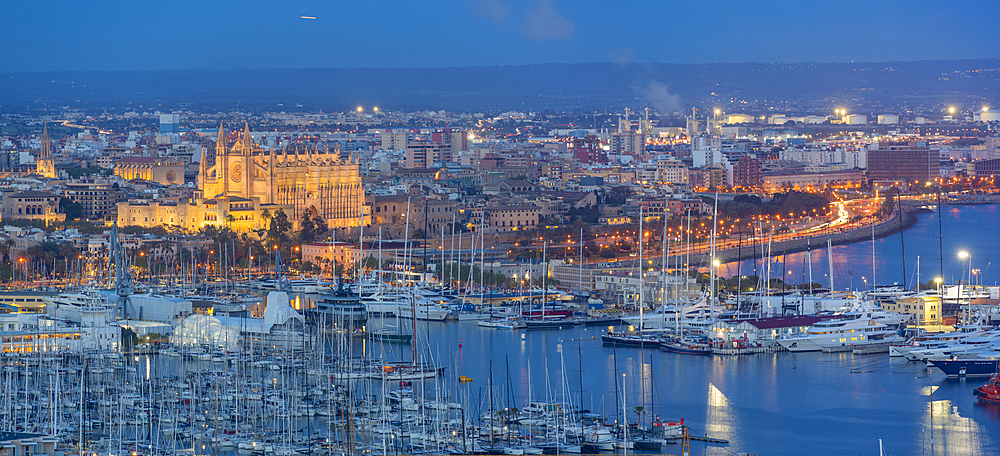 View of city skyline of Palma and cathedral from Castell de Bellver at dusk, Majorca, Balearic Islands, Spain, Mediterranean, Europe