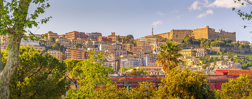 View of pastel coloured villas and Sant'Elmo Castle from Rotonda Diaz, Naples, Campania, Italy, Europe