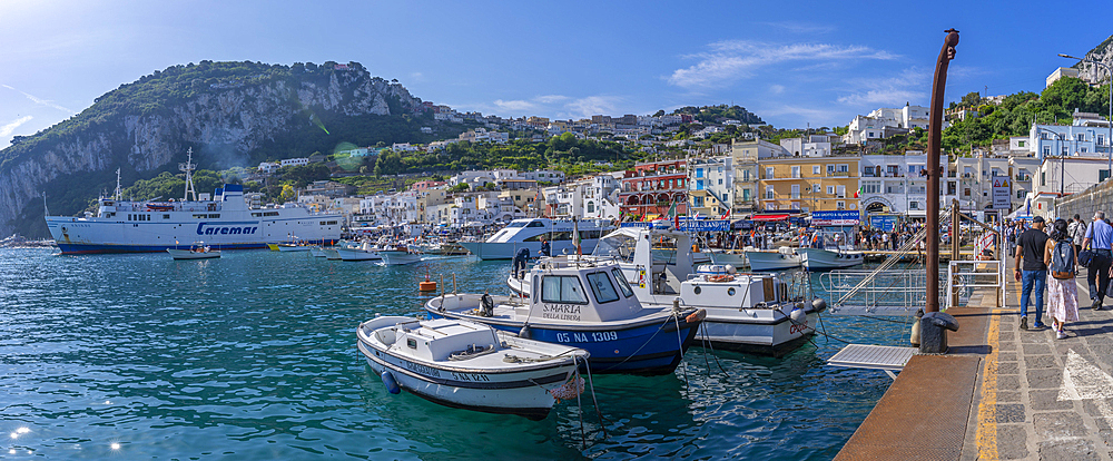 View of boats in Marina Grande overlooked by Capri Town in the background, Isle of Capri, Bay of Naples, Campania, Italy, Mediterranean, Europe