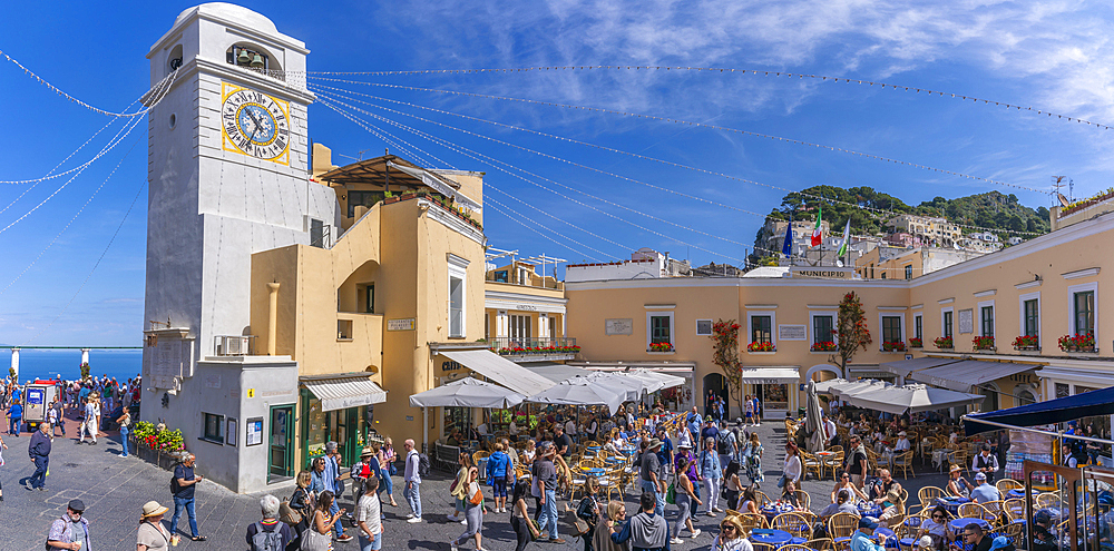 View of Clock Tower and cafes in Piazza Umberto I (La Piazzetta), Capri Town, Isle of Capri, Bay of Naples, Campania, Italy, Mediterranean, Europe