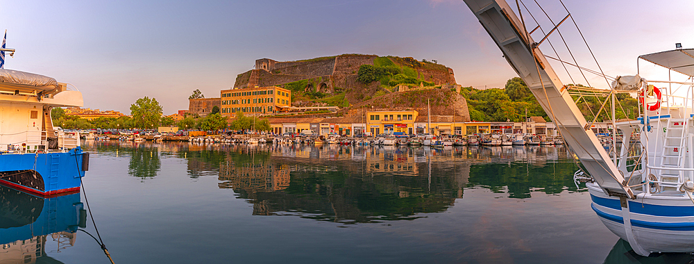 View of the New Fortress overlooking the Old Port Marina at sunset, Corfu, Ionian Sea, Greek Islands, Greece, Europe