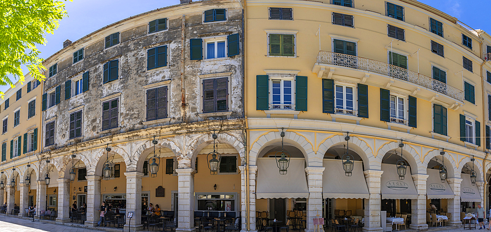 View of buildings and restaurants on the Liston Esplanade, Corfu Old Town, Corfu, The Ionian Islands, Greek Islands, Greece, Europe