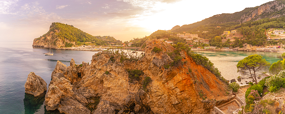 View of coastline and Ionian Sea near Palaiokastritsa at sunset, Palaiokastritsa, Corfu, Ionian Sea, Greek Islands, Greece, Europe