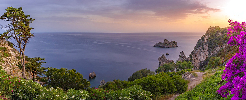 View of coastline from Monastery of Paleokastritsa at sunset, Palaiokastritsa, Corfu, Ionian Sea, Greek Islands, Greece, Europe