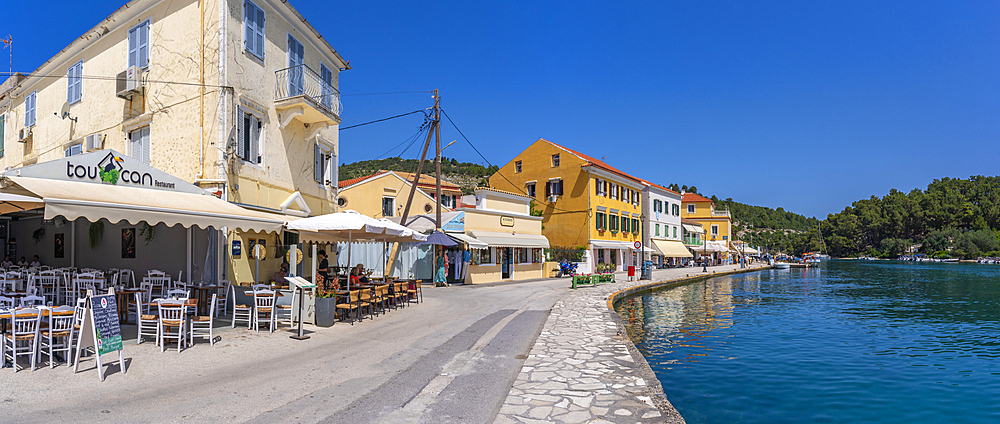 View of cafes in the harbour in Gaios Town, Paxos, Ionian Sea, Greek Islands, Greece, Europe