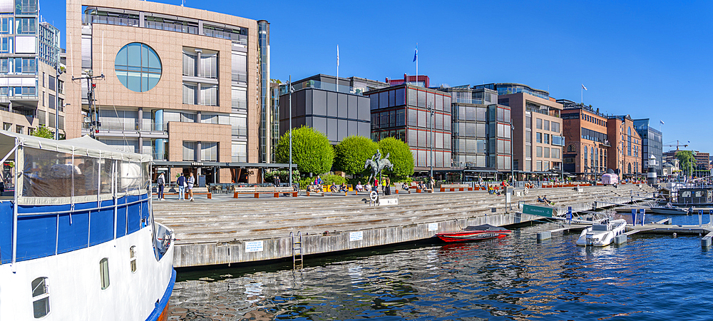 View of cafes and architecture at the waterfront, Aker Brygge, Oslo, Norway, Scandinavia, Europe