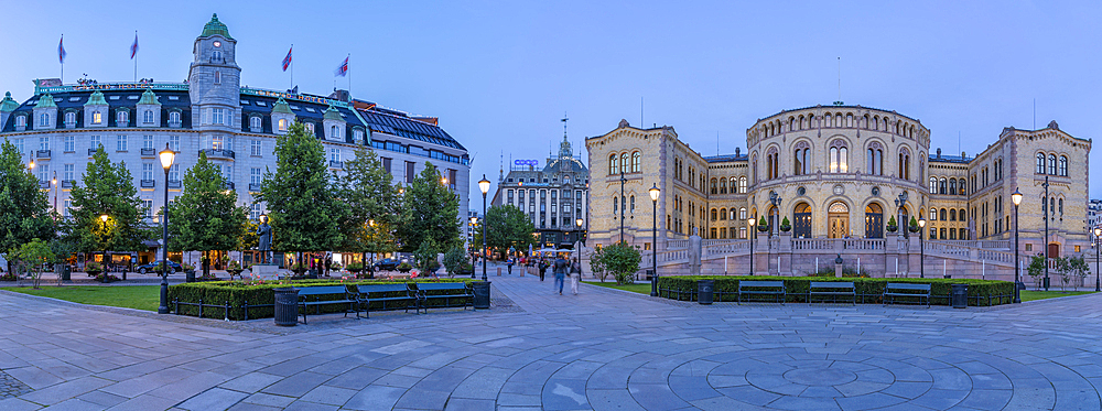 View of Grand Hotel and Norwegian Parliament from Eidsvolls Plass at dusk, Oslo, Norway, Scandinavia, Europe