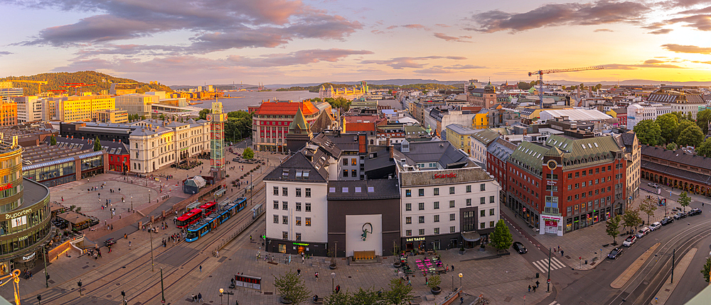 View of Jernbanetorget and city skyline from elevated position at sunset, Oslo, Norway, Scandinavia, Europe