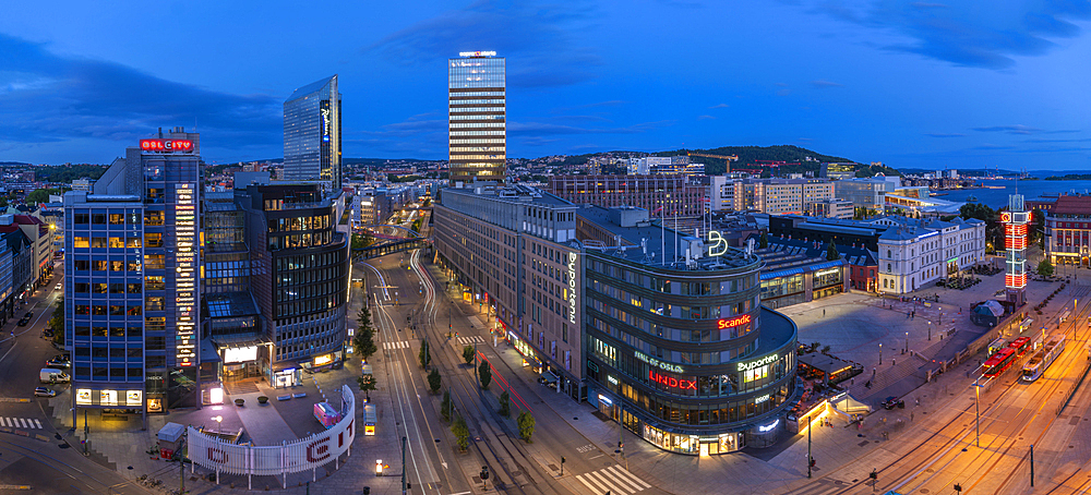 View of Jernbanetorget and city skyline from elevated position at dusk, Oslo, Norway, Scandinavia, Europe