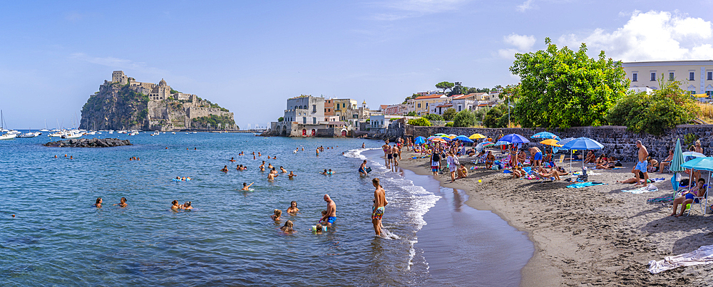 View of Miramare e Castello beach and Aragonese Castle in background, Port of Ischia, Island of Ischia, Campania, Italy, Europe