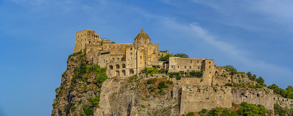 View of Aragonese Castle at sunset, Port of Ischia, Island of Ischia, Campania, Italy, Europe