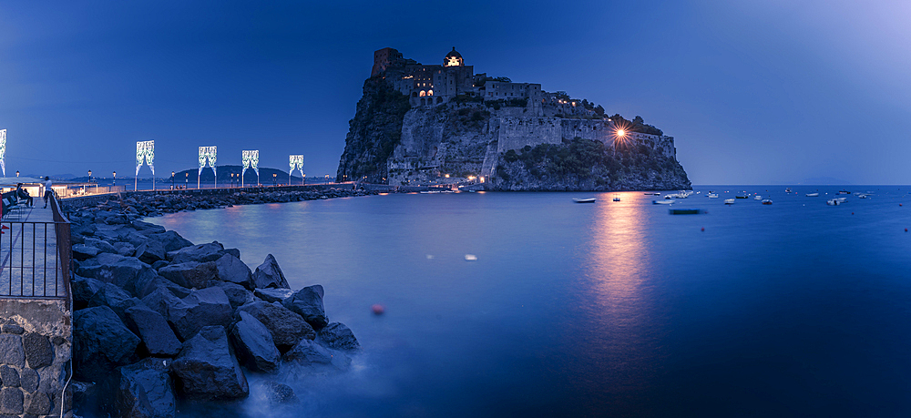 View of Aragonese Castle at dusk, Port of Ischia, Island of Ischia, Campania, Italy, Europe