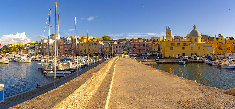 View of Church of Santa Maria della Pieta in the fishing port Marina Grande with boats at golden hour, Procida, Phlegraean Islands, Gulf of Naples, Campania, Southern Italy, Italy, Europe