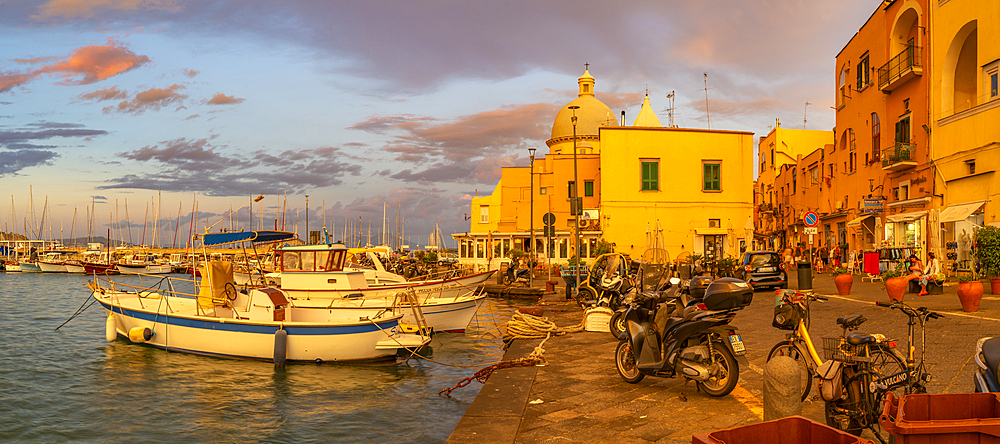 View of Church Madonna delle Grazie in the fishing port Marina Grande with boats at golden hour, Procida, Phlegraean Islands, Gulf of Naples, Campania, Southern Italy, Italy, Europe