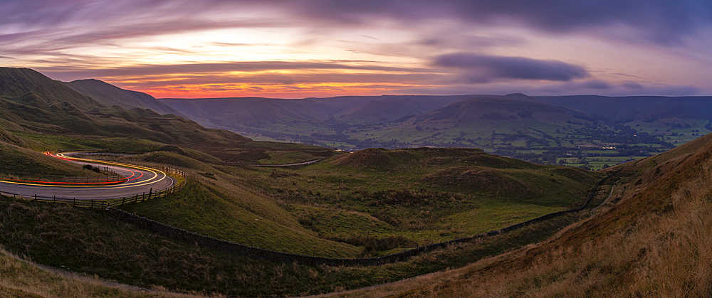 View of landsacpe and trail. lights in the Hope Valley at sunset, Peak District National Park, Baslow, Derbyshire, England, United Kingdom, Europe