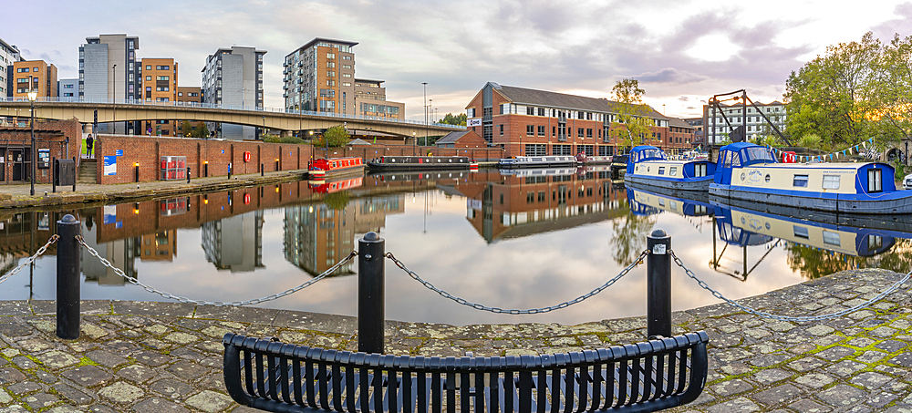 View of canal boats at Victoria Quays at sunset, Sheffield, South Yorkshire, England, United Kingdom, Europe