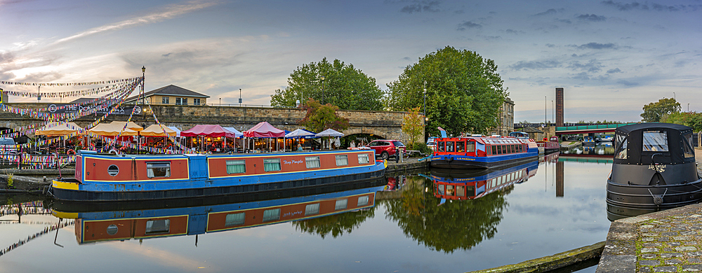 View of canal boats at Victoria Quays at sunset, Sheffield, South Yorkshire, England, United Kingdom, Europe