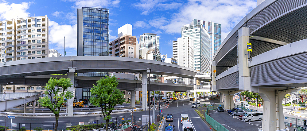 View of road intersection and highrise buildings in the Minato City, Roppongi, 3 Chome−1 District, Tokyo, Honshu, Japan