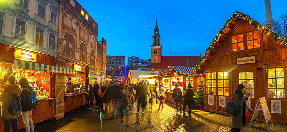 View of St. Mary's Church and Christmas market in Wasserkaskaden at dusk, Mitte, Berlin, Germany, Europe