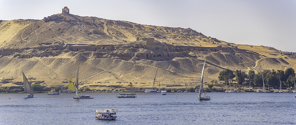 View of fellucas on the Nile river on a sunny day, Aswan, Nubia, Egypt, North Africa, Africa