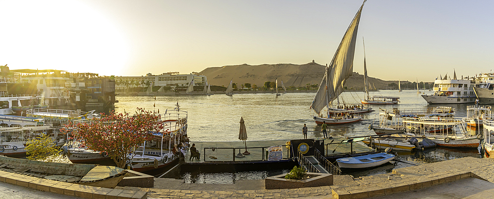 View of fellucas on the Nile river during golden hour, Aswan, Nubia, Egypt, North Africa, Africa
