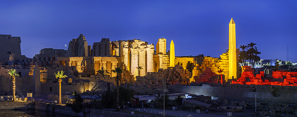 View of Karnak Temple sound and light show at dusk, Luxor, Egypt, Africa
