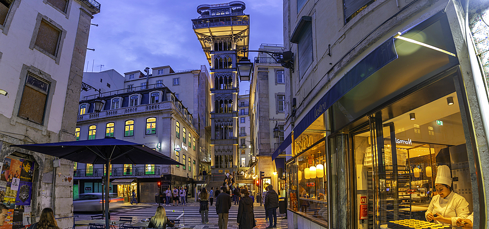 View of Santa Justa Lift and shops at dusk, Lisbon, Portugal, Europe
