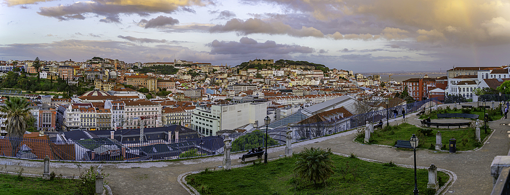 View of Lisbon from Miradouro de Sao Pedro de Alcantara at sunset, Lisbon, Portugal, Europe