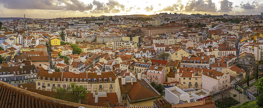 Panoramic view of Lisbon from Miradouro da Senhora do Monte scenic point at sunset in the Alfama District, Lisbon, Portugal, Europe