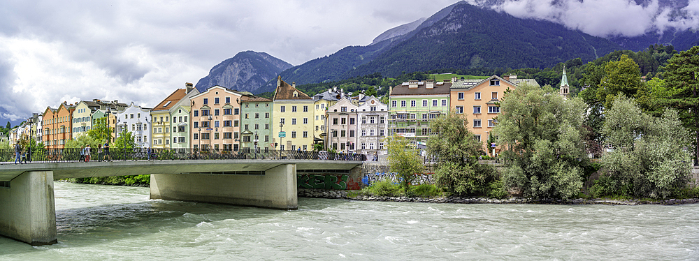 View of colourful buildings and River Inn on a sunny day in summer, Innsbruck, Tyrol Region, Austria, Europe