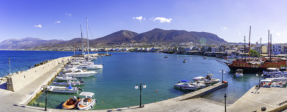 View of boats in Port of Hersonissos, Limenas Chersonisou, Crete, Greek Islands, Greece, Europe