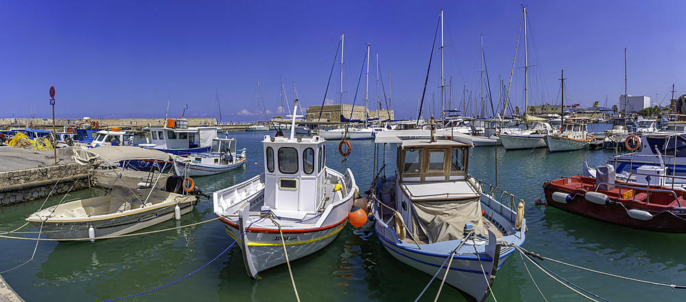 View of Koules Venetian Fortress and boats in Heraklion Venetian Port on a sunny day, City of Heraklion, Crete, Greek Islands, Geece, Europe