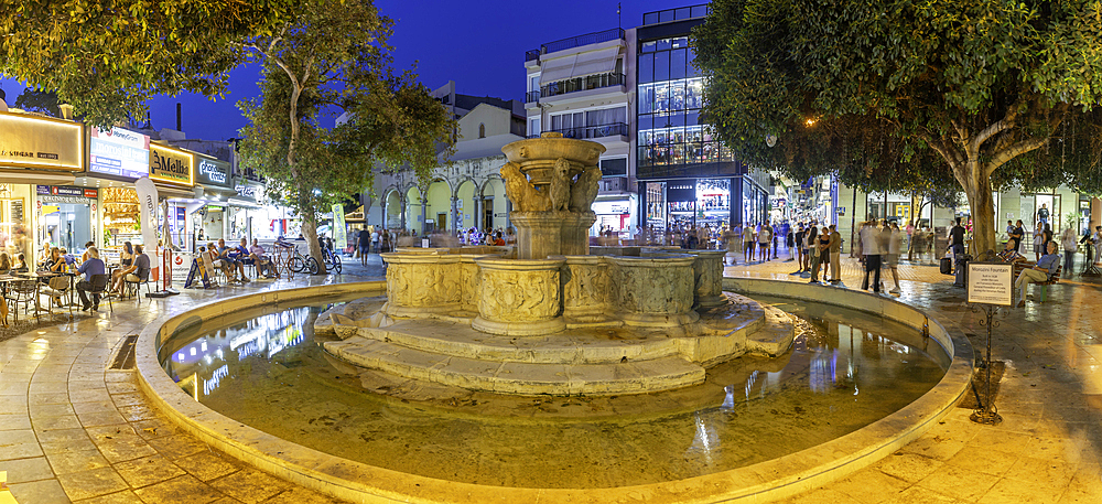 View of Morosini Fountain at dusk, City of Heraklion, Crete, Greek Islands, Geece, Europe
