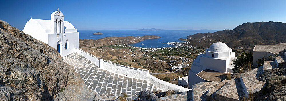 View of Livadi Bay and white Greek Orthodox churches from atop Pano Chora, Serifos, Cyclades, Aegean Sea, Greek Islands, Greece, Europe