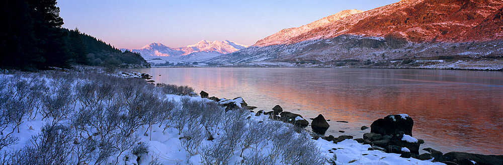 Mount Snowdon in snow at sunrise with frozen LLynnau Mymbyr lake, Capel Curig, Snowdonia National Park, Wales, United Kingdom, Europe