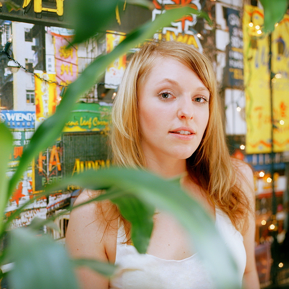 Young woman looking at camera, portrait, Düsseldorf, North Rhine-Westphalia, Germany