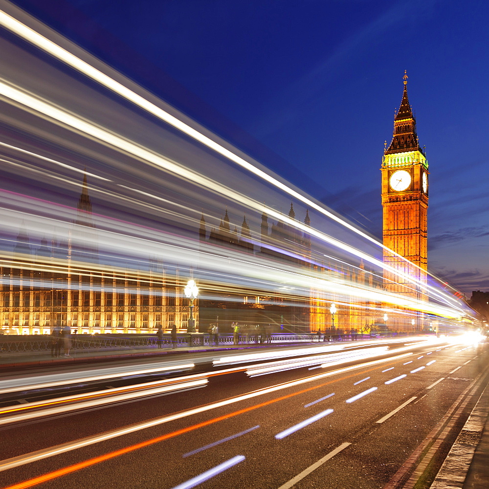 Motion blurred red double decker bus, Houses of Parliament, Big Ben, Westminster Bridge, London, England, United Kingdom, Europe