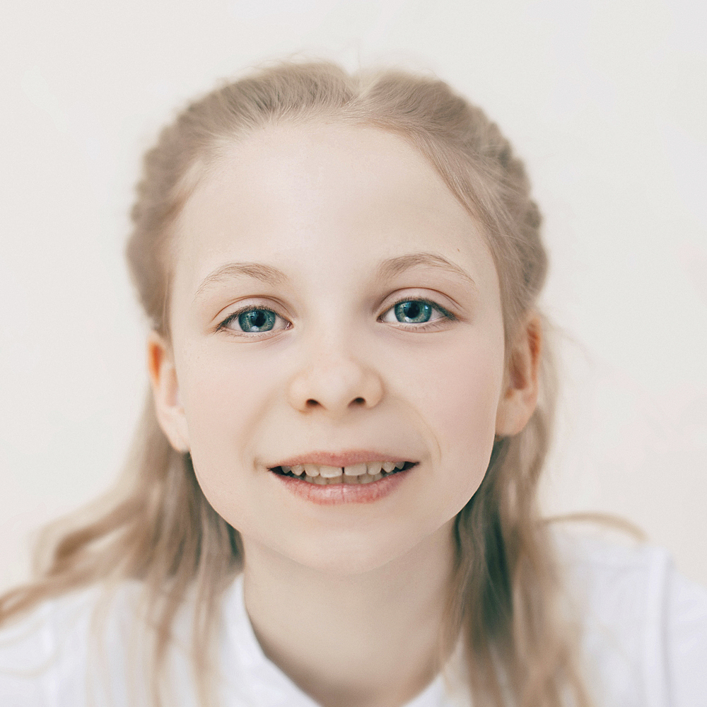 Close up of smiling Caucasian girl