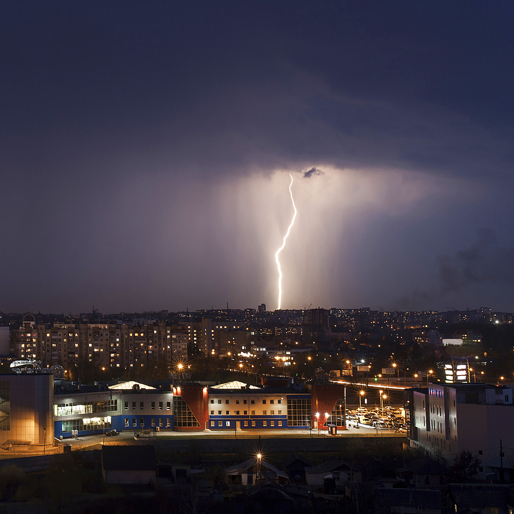 Lightning strike in city at night