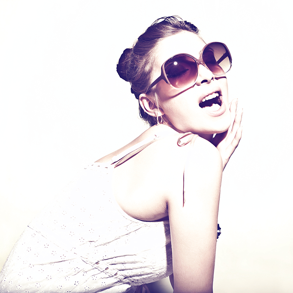 Portrait of glamorous woman wearing sunglasses