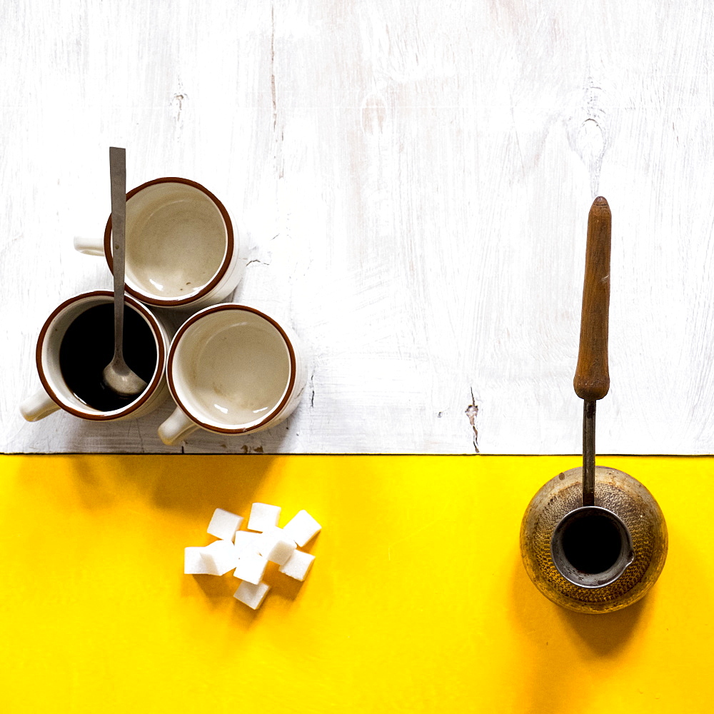 Coffee and sugar on table