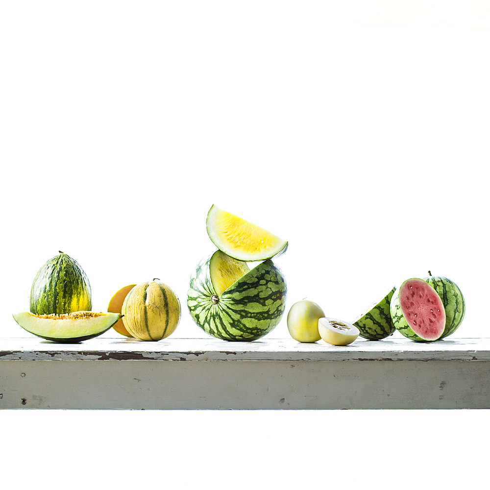 Sliced melons on table