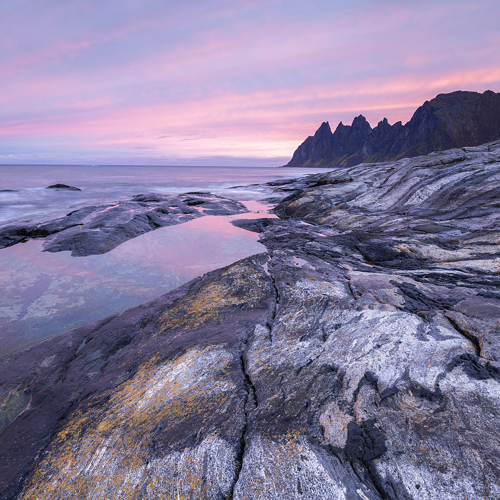 Coastal view at dawn of Devil's Teeth Mountain, Tungeneset, Senja, Troms og Finnmark, Norway, Scandinavia, Europe