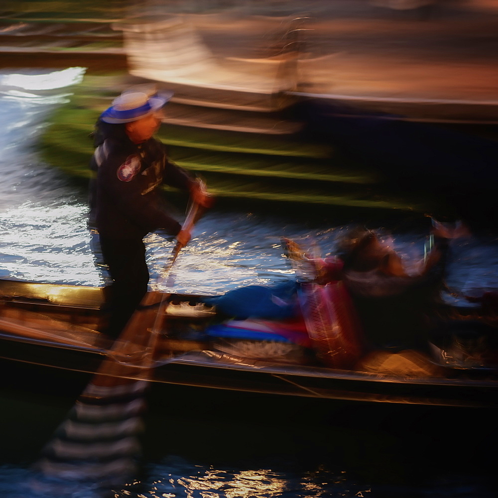 Blurred image of gondolier in Venice, Italy, Europe