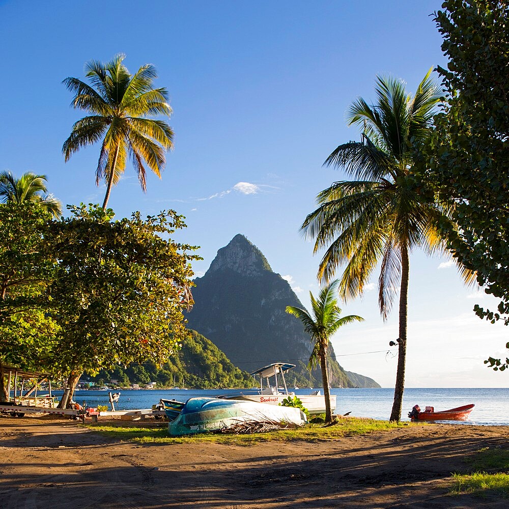 View from palm-fringed beach across Soufriere Bay to Petit Piton, evening, Soufriere, St. Lucia, Windward Islands, Lesser Antilles, West Indies, Caribbean, Central America